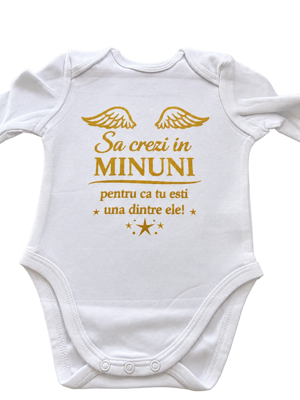 Body alb cu mesaj auriu despre minuni, aripi și stele